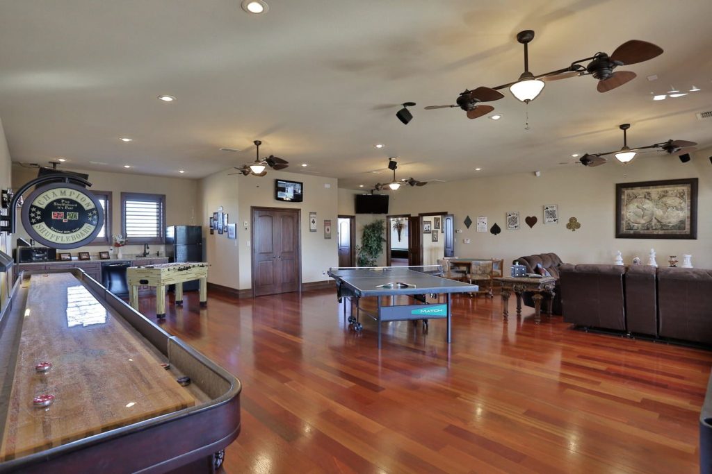 Game room with pool table at Rusted Oaks Estate