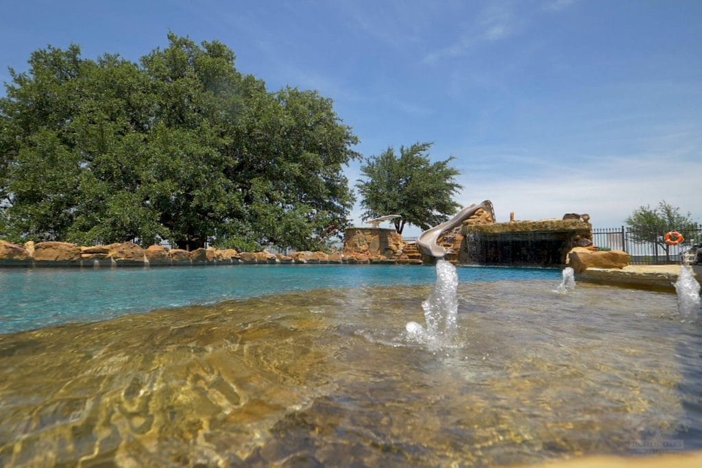 pool-waterfall-slide-daytime-1